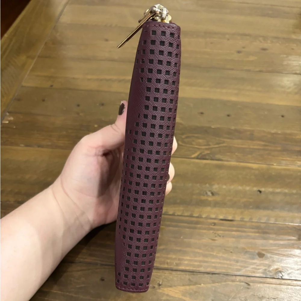 Kate Spade Cameron Street Perforated Rose Lacey Wallet in Deep Plum